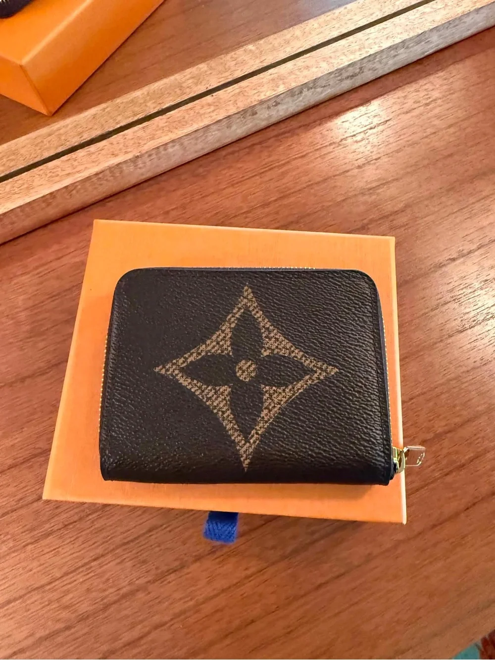 Louis Vuitton Zippy coin purse.